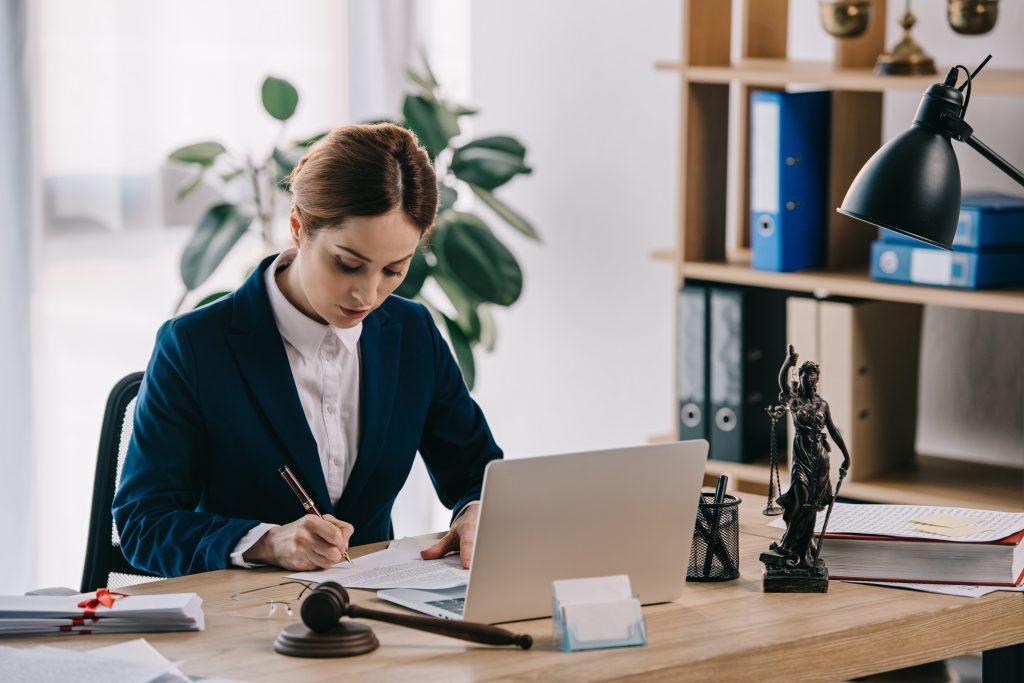 Lawyer with laptop doing real world blockchain timestamping.