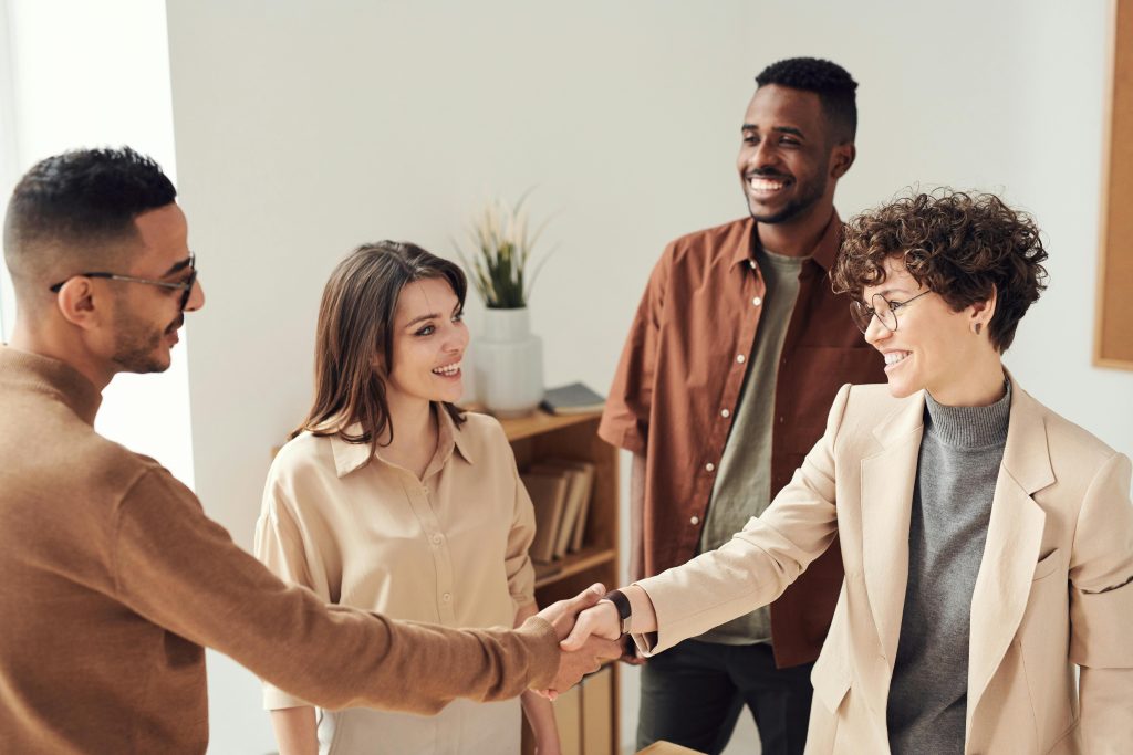 Business handshake in a meeting room. Secure Timestamp Verification for Business Records in real estate and property.