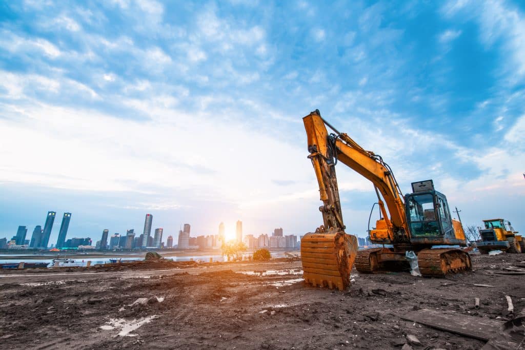 Blockchain construction timestamping for site progress photos, looking at excavator.
